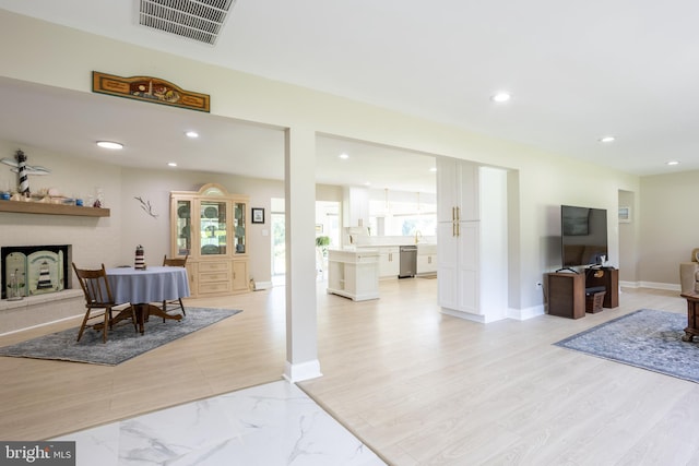 dining area with light wood-type flooring