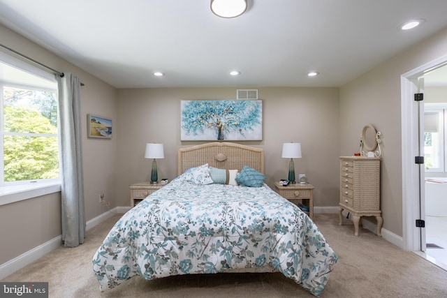 bedroom featuring recessed lighting, visible vents, baseboards, and light colored carpet