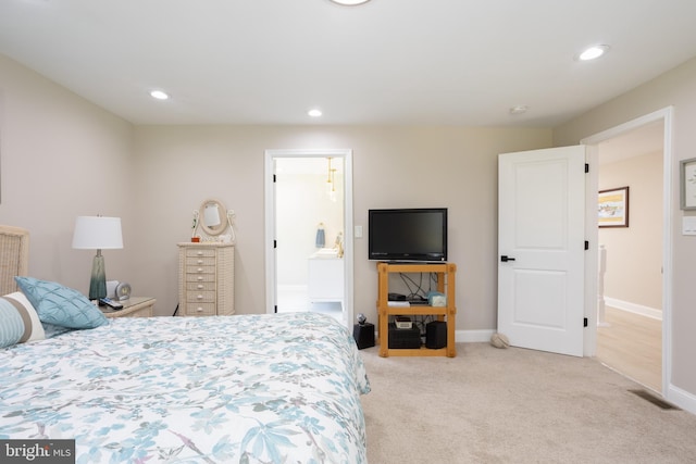 bedroom with light carpet, baseboards, visible vents, connected bathroom, and recessed lighting