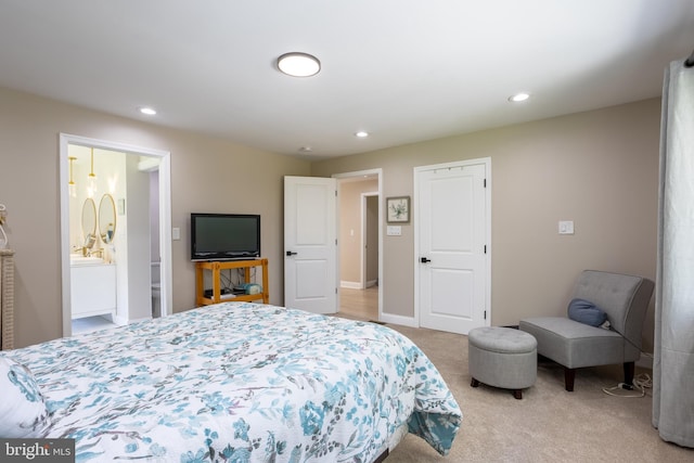 bedroom featuring recessed lighting, light carpet, and baseboards