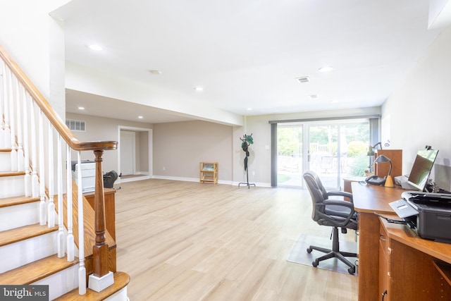 home office with baseboards, recessed lighting, visible vents, and light wood-style floors