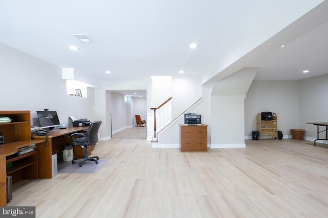 home office featuring recessed lighting, baseboards, and light wood finished floors