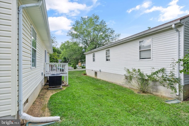 view of yard featuring central AC