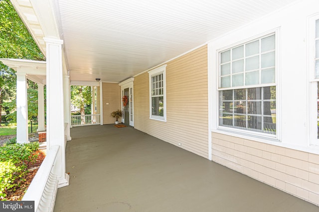 view of patio featuring a porch