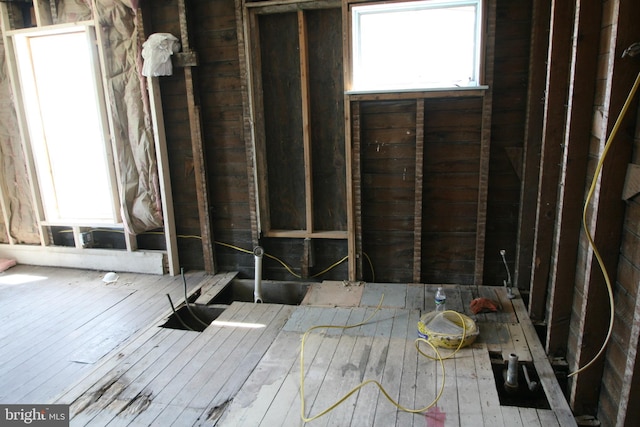 miscellaneous room with wood finished floors