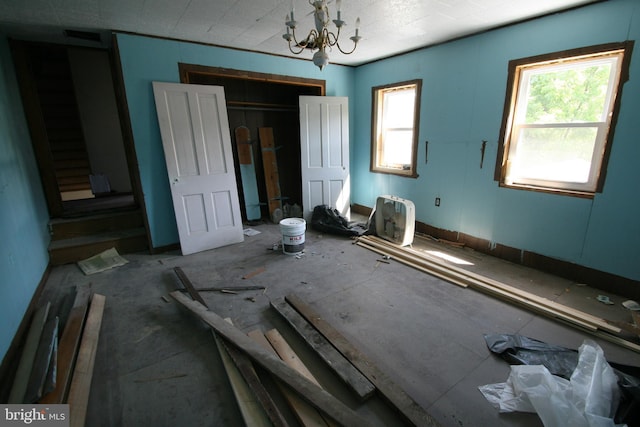 interior space with a chandelier