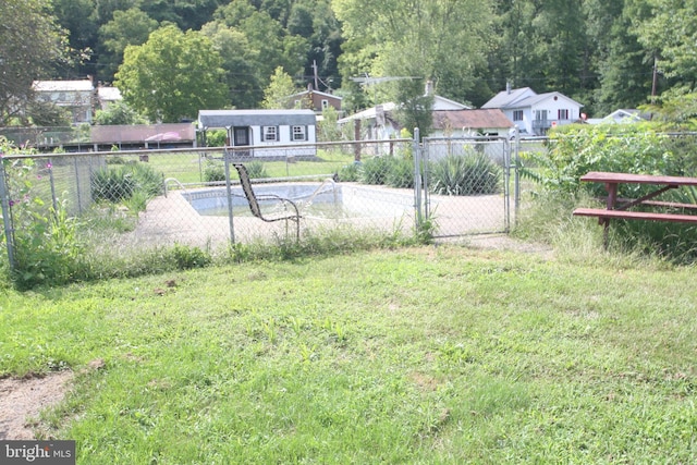 view of yard with fence and a patio