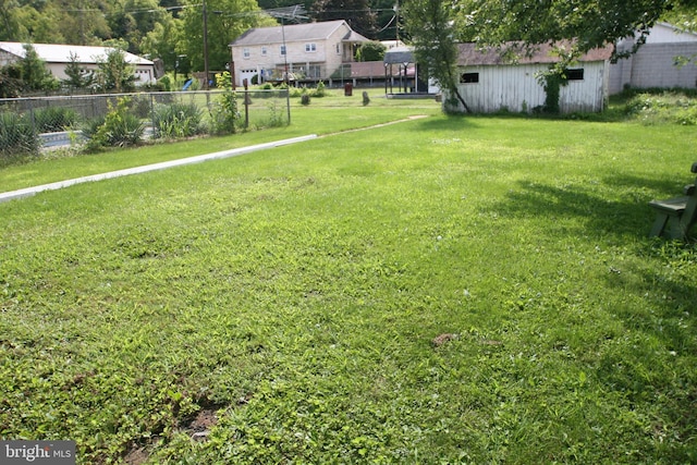 view of yard featuring fence