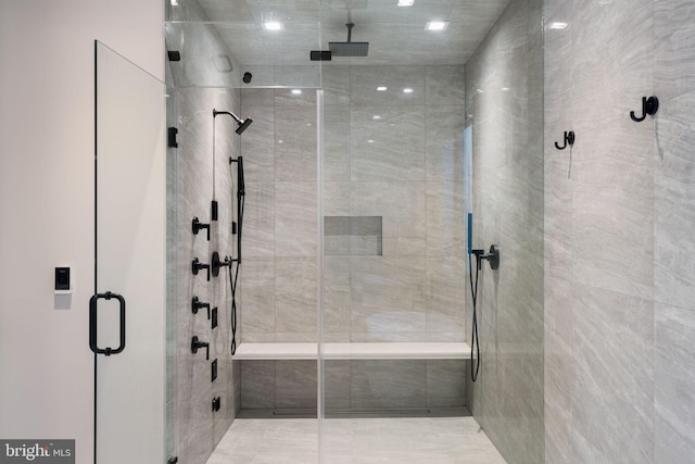 full bathroom with a shower stall