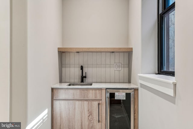 bar featuring sink and wine cooler