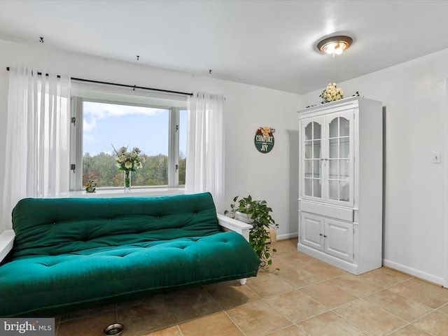 sitting room featuring light tile patterned floors