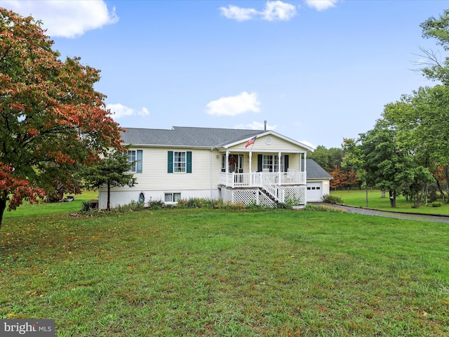 view of front facade with a porch and a front yard