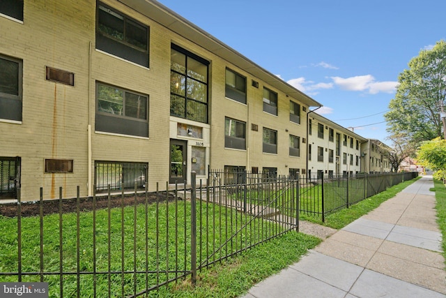 view of property featuring fence