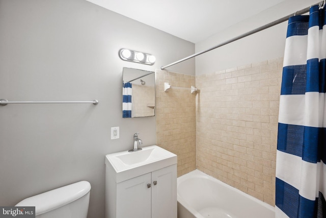 full bath featuring toilet, shower / tub combo, and vanity