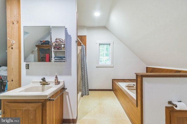 full bathroom with lofted ceiling, a shower stall, vanity, and a bath