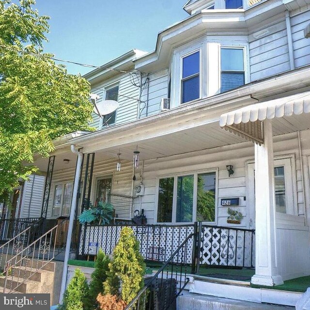 entrance to property with a porch