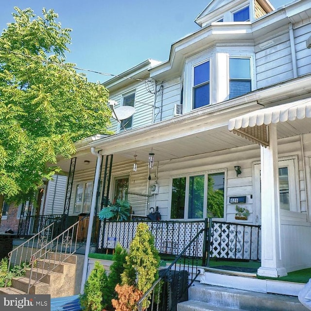 doorway to property with a porch