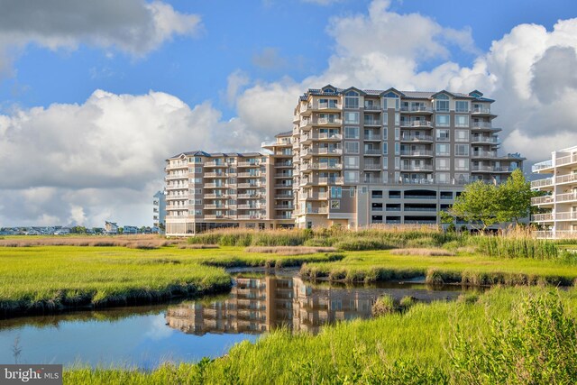 view of building exterior with a water view