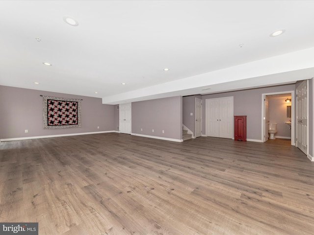 unfurnished living room with light wood-type flooring