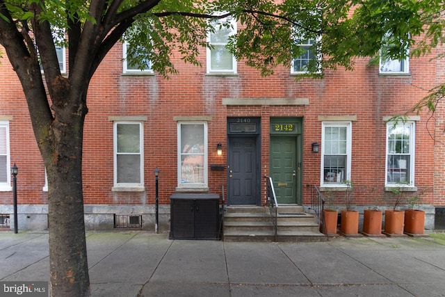 view of front of home featuring central air condition unit