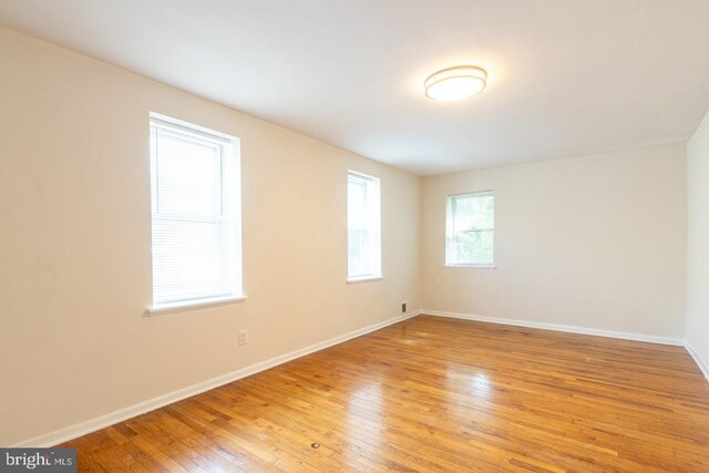 empty room with light wood-type flooring