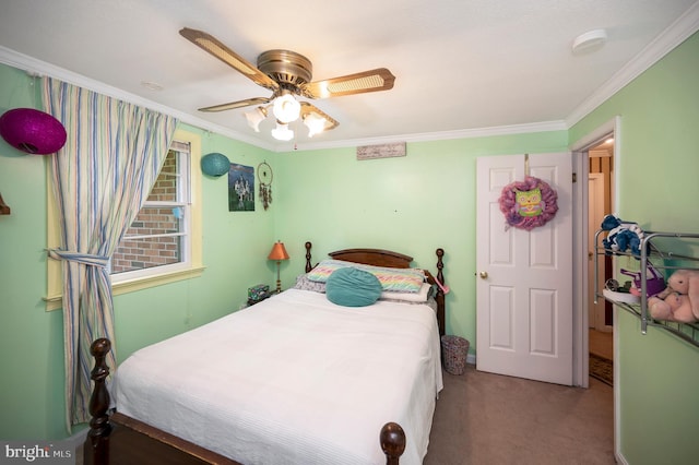 carpeted bedroom featuring ceiling fan and crown molding