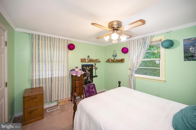 bedroom with carpet flooring, ceiling fan, and ornamental molding