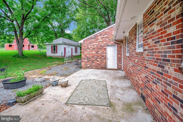 view of patio / terrace with a storage unit