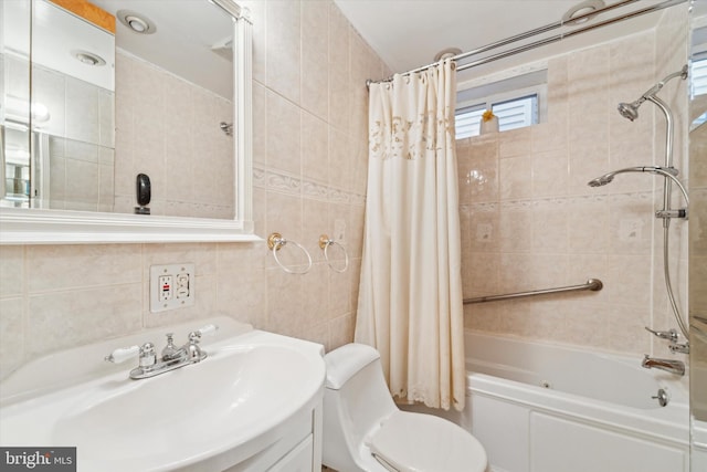 full bathroom featuring sink, toilet, decorative backsplash, shower / bath combo with shower curtain, and tile walls