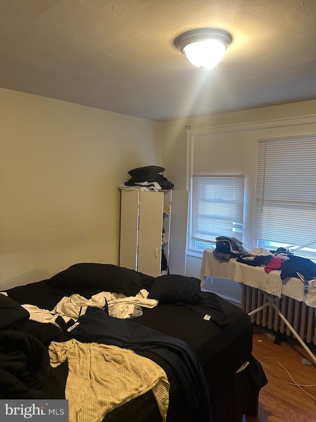 bedroom featuring hardwood / wood-style flooring