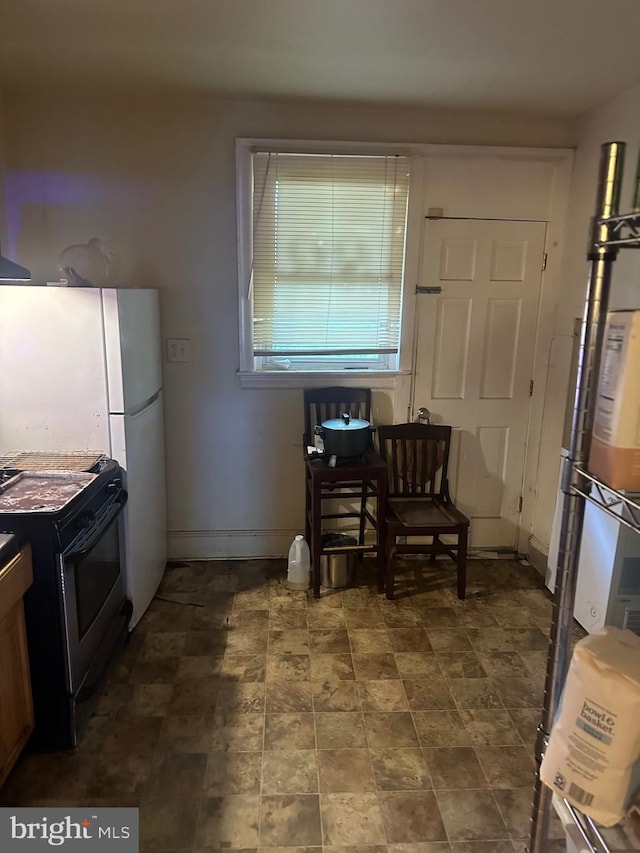 kitchen featuring black range