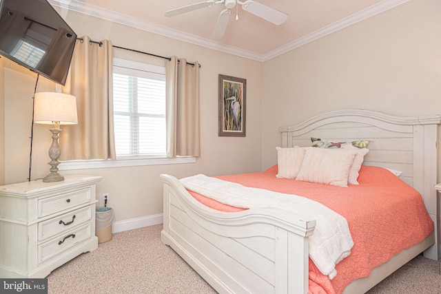 bedroom with ceiling fan, ornamental molding, and light carpet