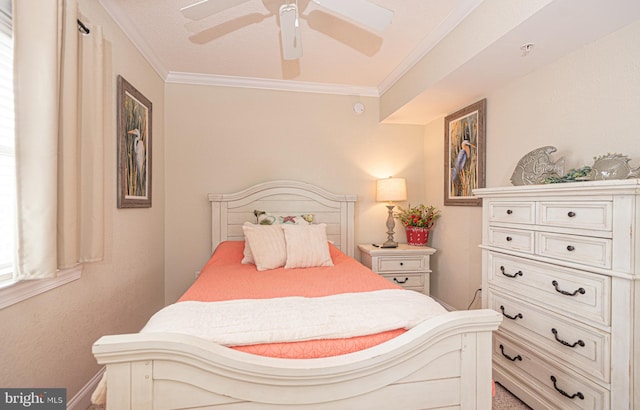 bedroom with ceiling fan and ornamental molding