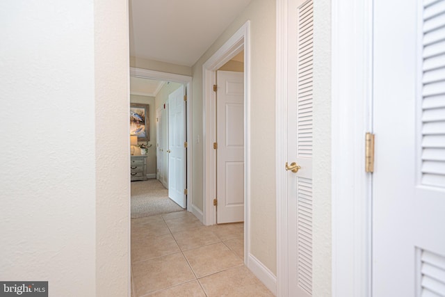 hallway with light tile patterned flooring