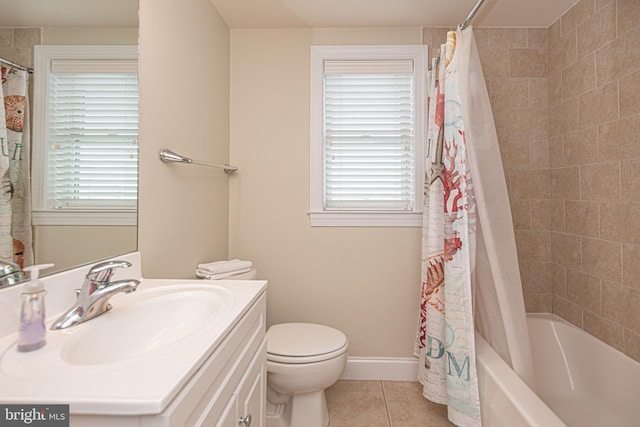 full bathroom featuring tile patterned floors, toilet, shower / tub combo with curtain, and vanity