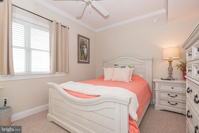 bedroom featuring ceiling fan, ornamental molding, and light carpet