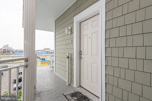 property entrance with a water view