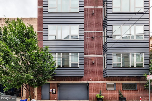 exterior space featuring a garage