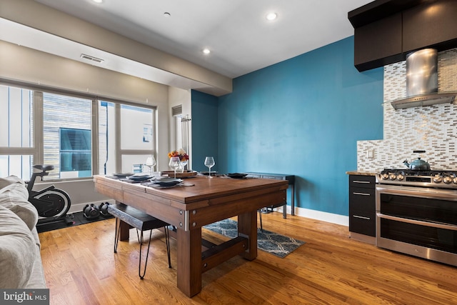 dining area featuring light hardwood / wood-style floors