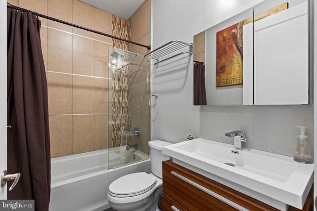 full bathroom with vanity, toilet, and shower / tub combo with curtain