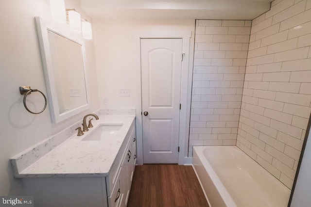 bathroom featuring vanity and hardwood / wood-style floors