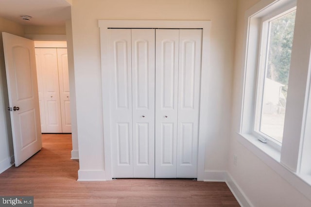 unfurnished bedroom featuring light hardwood / wood-style flooring