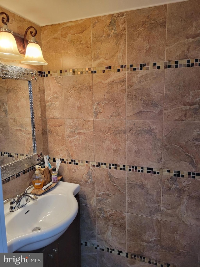 bathroom featuring vanity and radiator heating unit