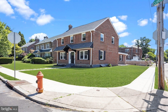 exterior space with a front lawn