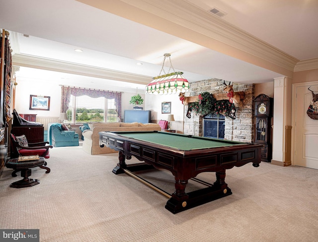 playroom with billiards, crown molding, carpet flooring, and a stone fireplace