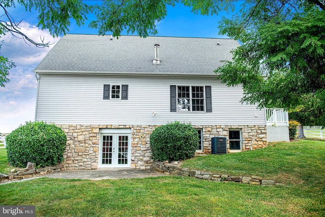 4116 Harford Creamery Rd, White Hall, MD 21161 - back of property with stone siding, a patio, french doors, central AC unit, and a yard