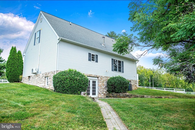 4116 Harford Creamery Rd, White Hall, MD 21161 - view of side of home with a lawn, fence, french doors, and stone siding