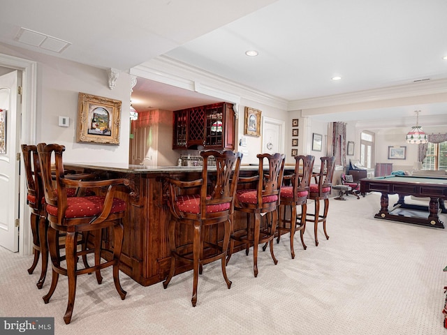 bar featuring light colored carpet, hanging light fixtures, billiards, and crown molding