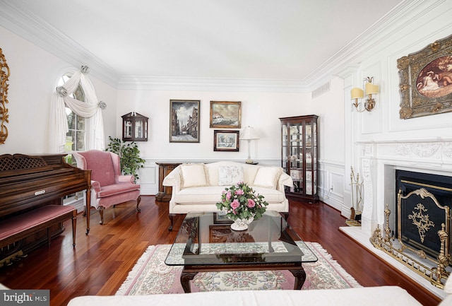 living room with ornamental molding and dark hardwood / wood-style floors