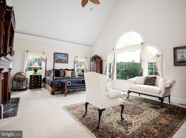 bedroom with high vaulted ceiling, ornamental molding, ceiling fan, and carpet flooring